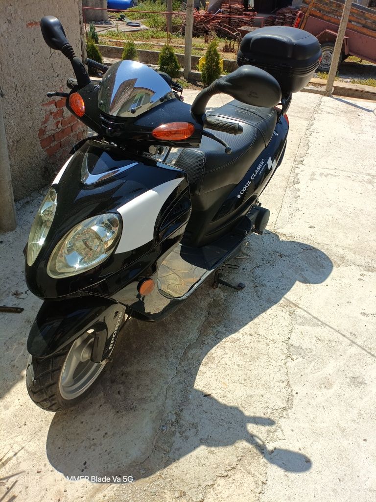 Скутер 125кубика