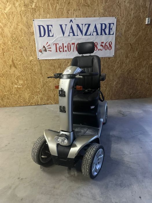 Cărucior scuter electric