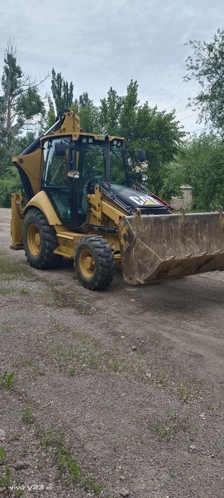 Услуги экскаватора погрузчика 3в1 трактор