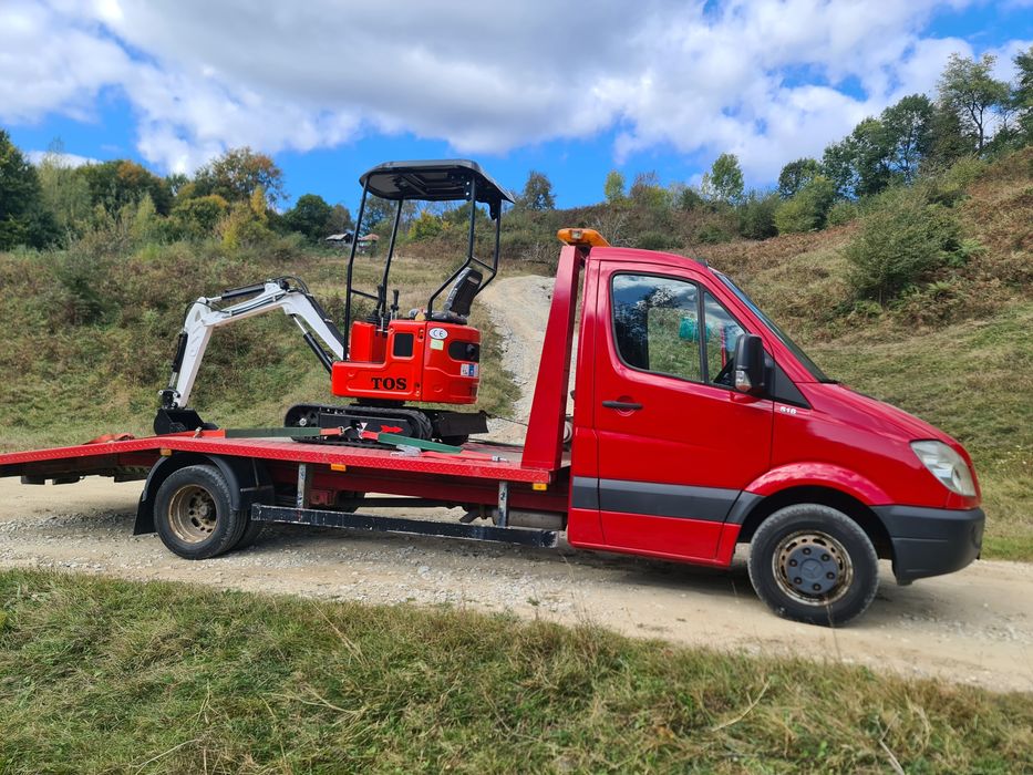 Servicii Tractări Non-Stop Asistenta rutieră Transport auto,utilaje