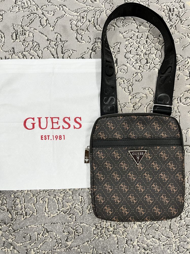 Продам срочно барсетку Guess