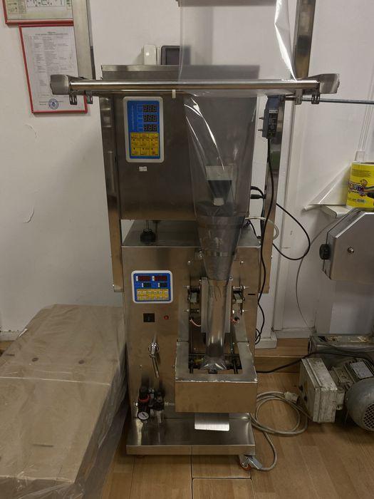 Вертикальная упаковочная машина дл сыпучих фасовщик упаковщик в пленку