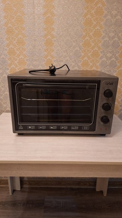Продам отдельностоящую духовку Artel