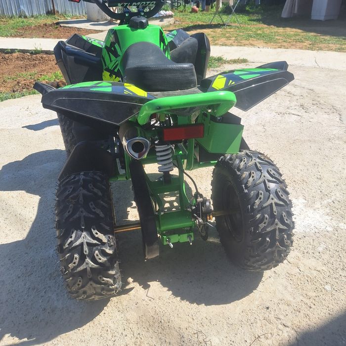 Vând ATV pt copi pe benzina  nou nouț folosit de 2 .3 ori