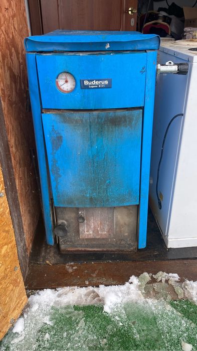 Печка Будерес на твердом топливе длительного сгорания