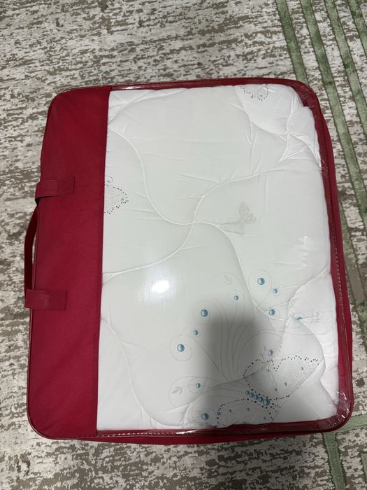 Продам новое одеяло двуспальное