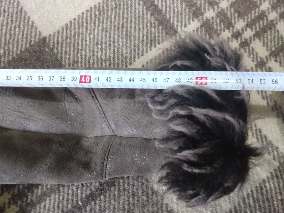 Детски кожух от естествена кожа за момиче .