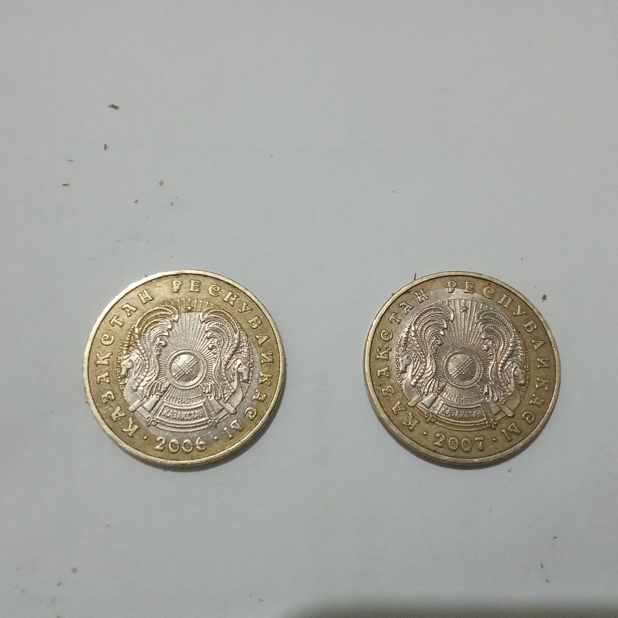 Монеты 100 тенге Пара  Брак 2006-7 г