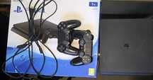Playstation 4 slim 1 TB + 13 jocuri cu cutie originala