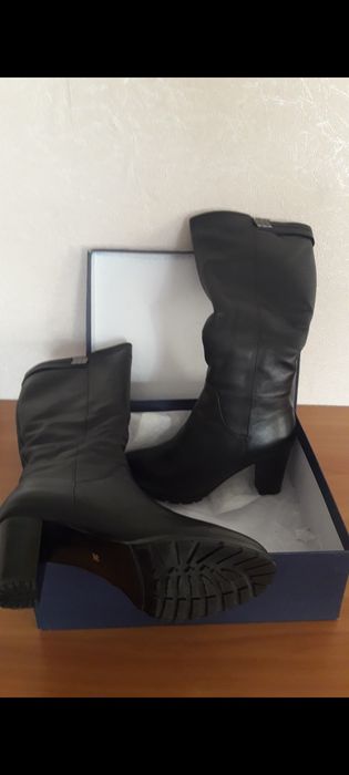 Продам новые зимние сапоги