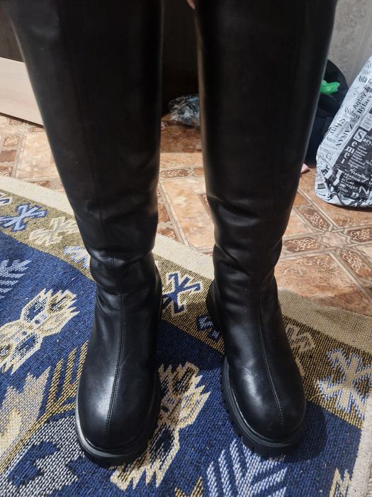 Продам новый сапоги