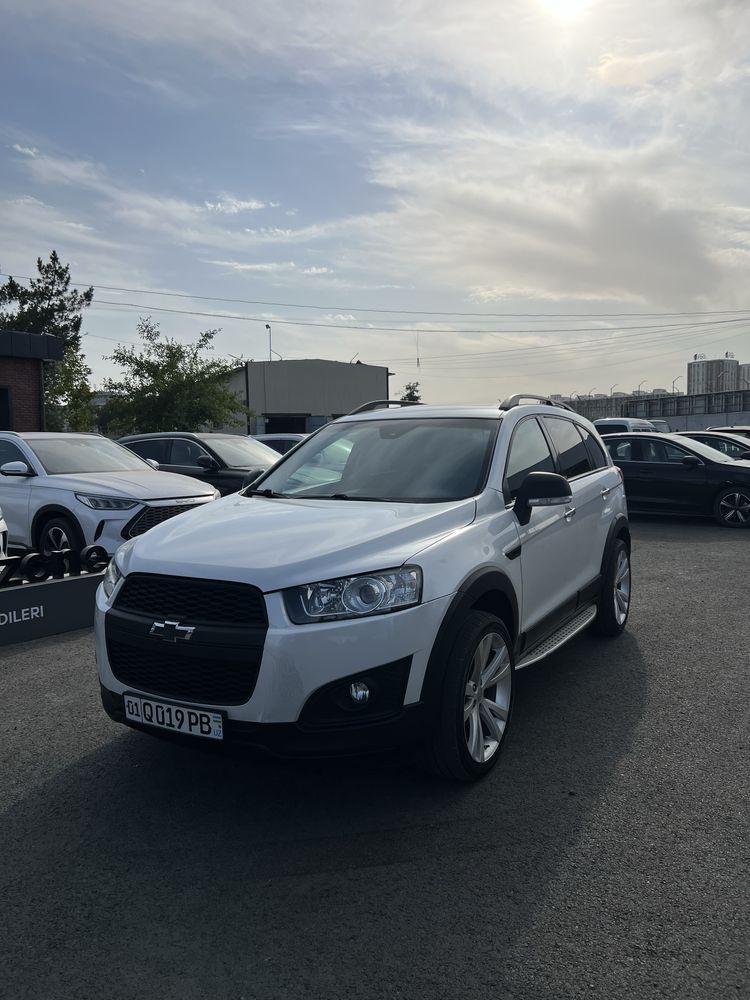 Captiva 3+ 2015 yil oq jemchuk zo'r holatda