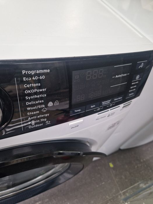 Пералня със сушилня AEG 9 кг AutoDos Wi Fi