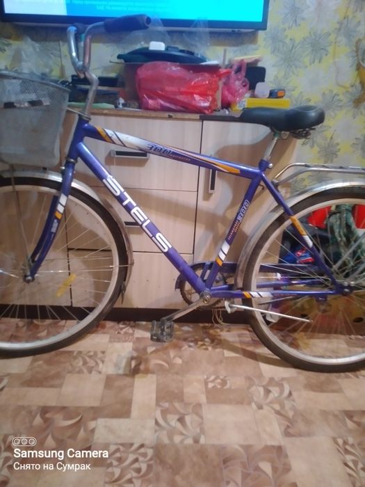 Взрослый велосипед марки Стэлс 300