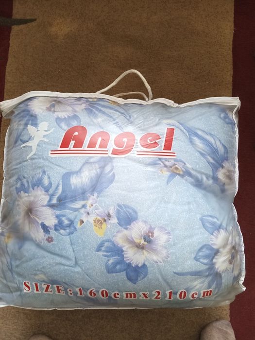 Продам новое тёплое одеяло  210×160см голубое