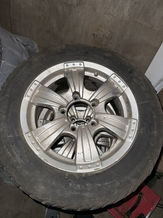 Продам диски от нивы и шины