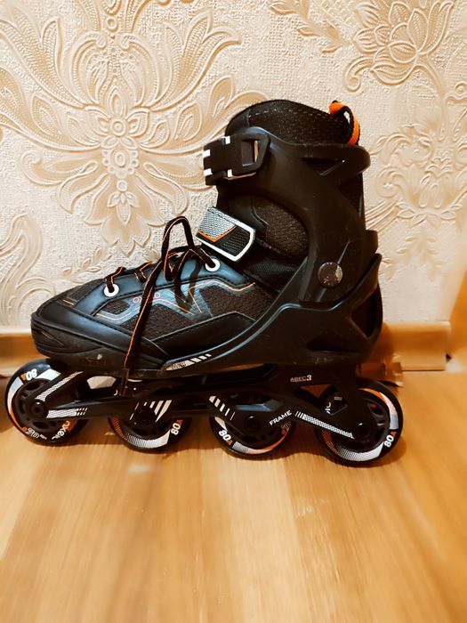 Роликовые коньки