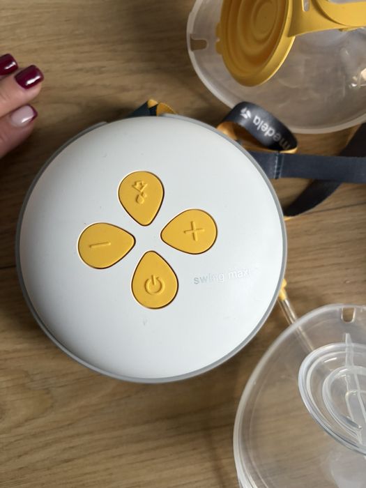 Двуфазна електрическа двойна помпа Medela - Swing Maxi, Hands-Free