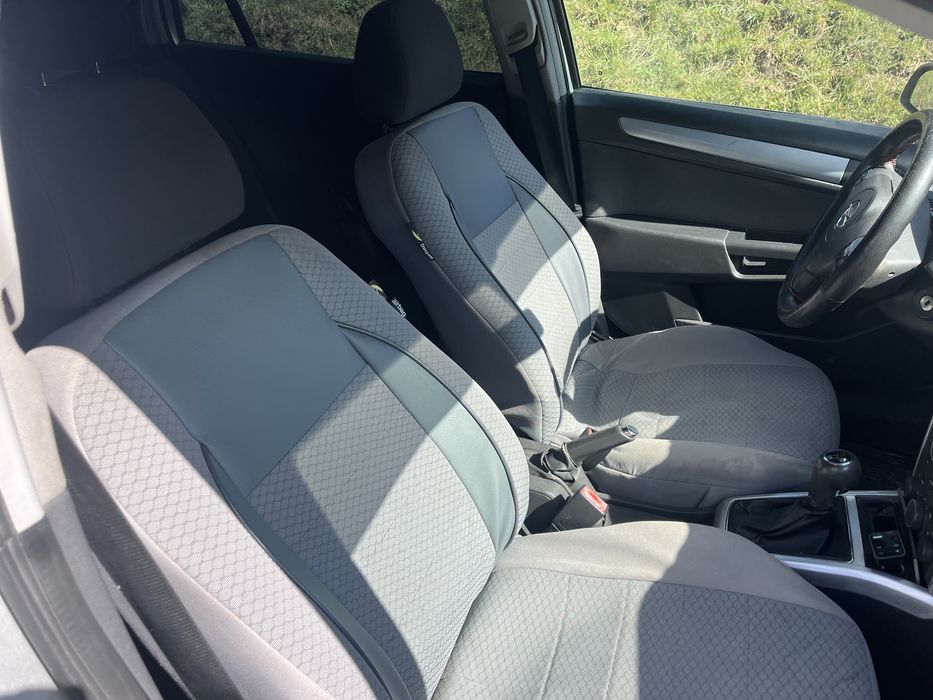 Vand sau schimb opel asta h  pret :2300€