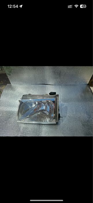 Фара основная левая TOYOTA HILUX