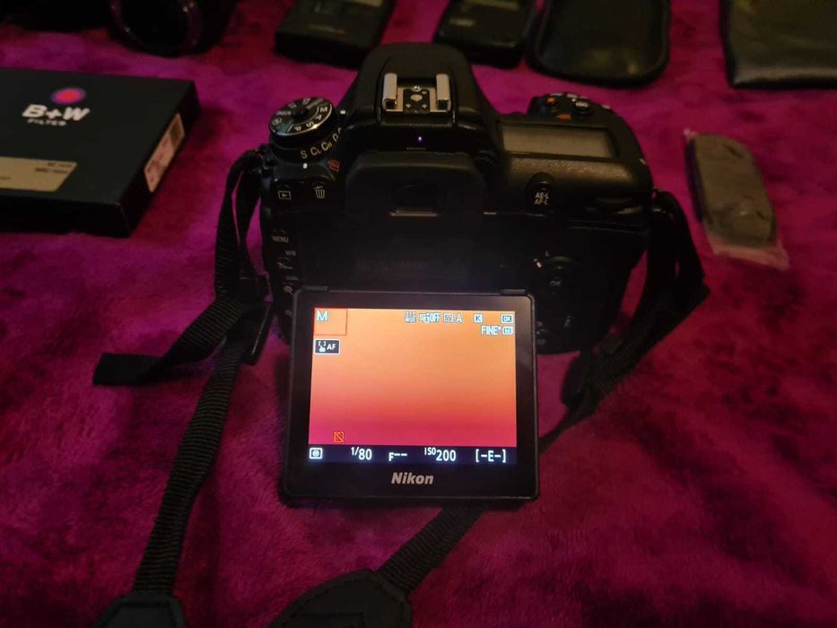 Camere Nikon folosite ambele