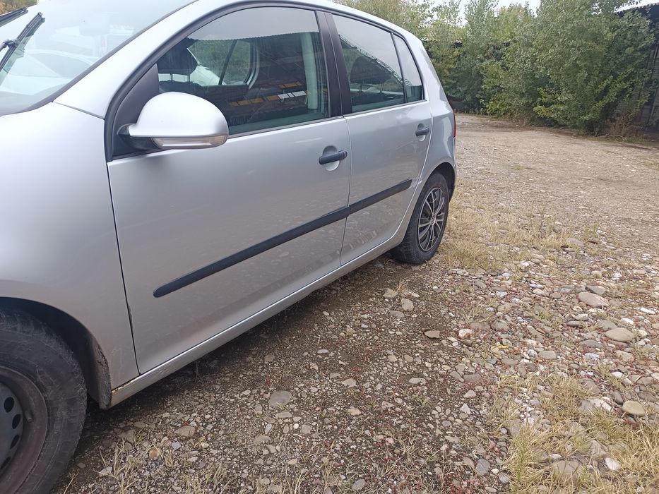 Golf 5 .2500 e .ușor negociabil
