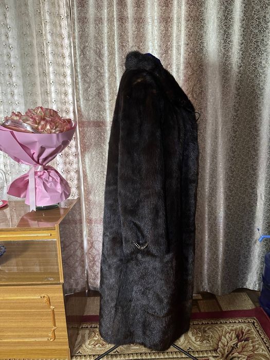 Натуральные норковые шубы большого размера.