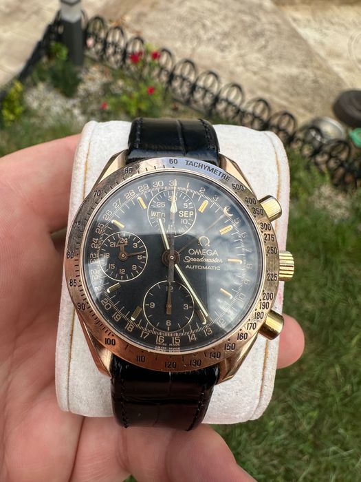 Омега Omega speedmaster day date. 18к златен мъжки часовник.