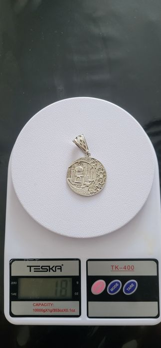 Продам серебряный кулон