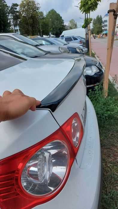 Eleron pentru portbagaj Volkswagen Jetta Mk5