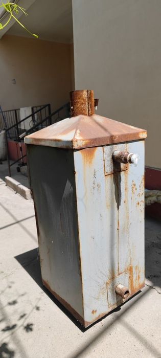 Котёл отопительный многотопливный КОМ-16