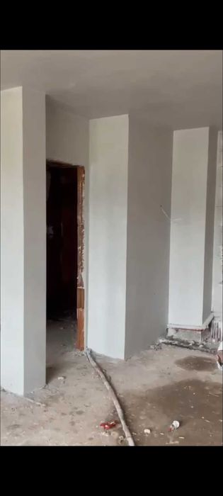 Машинна мазилка, шпакловка-боя.