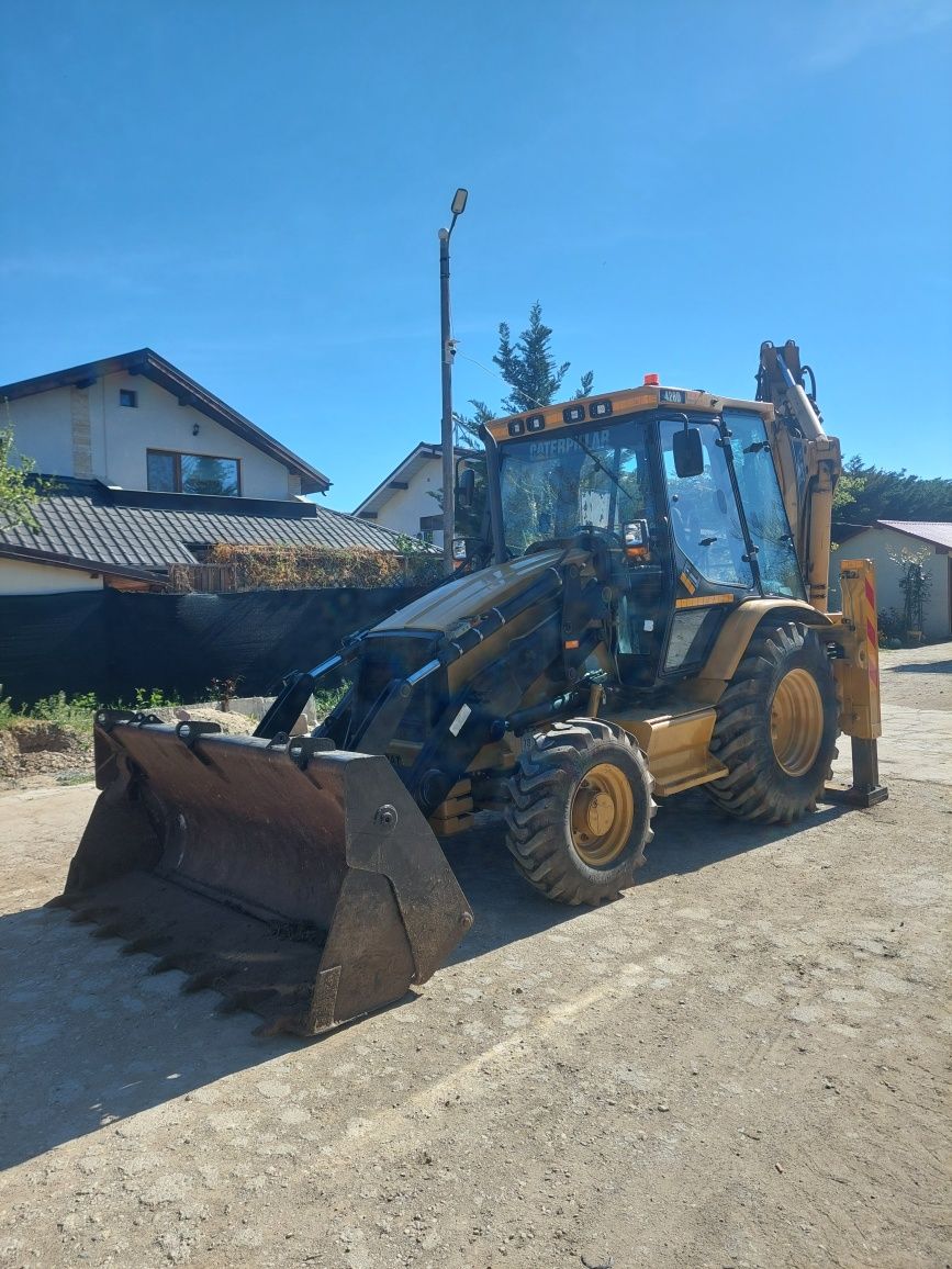 Buldoexcavator CAT 428D