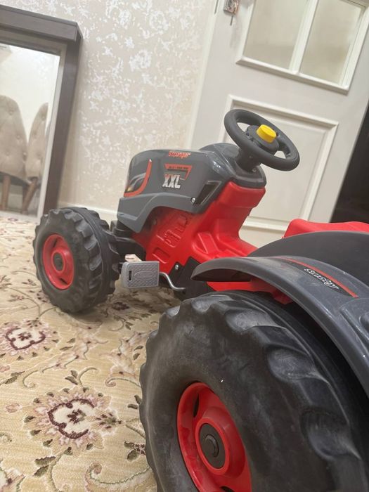 Детский трактор виде механической машины