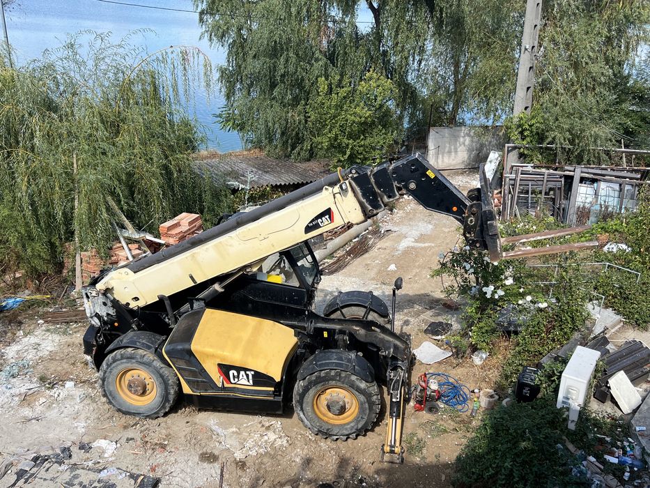 Vand caterpillar telehandler 417C ( manitou) cu brat de 17 metri
