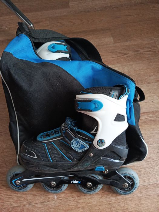 Роликовые коньки