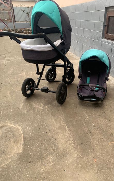 Продам фирменную коляску трансформер  в придачу с Детским Автокреслом