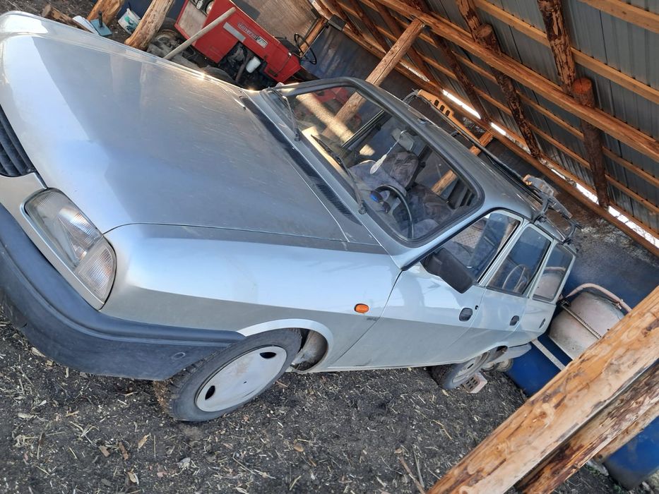 Vând Dacia Break.