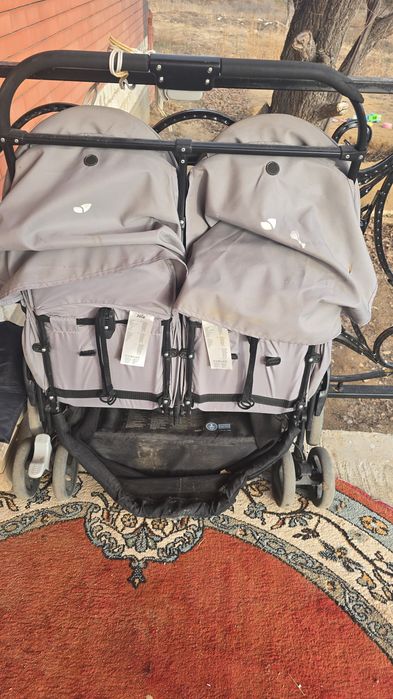 Егіз балаларға арналған коляска