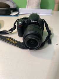 Nikon D5100 cu obiectiv kit 18-55 mm