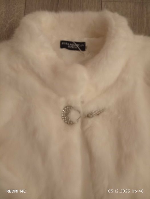 Чисто ново палто