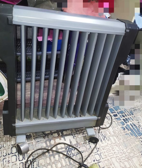 Масляный обогреватель