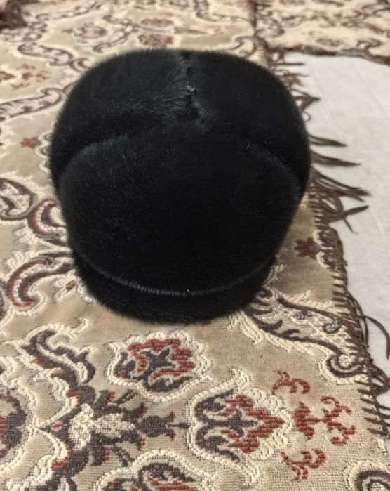 Продам  зимнюю мужчку шапку