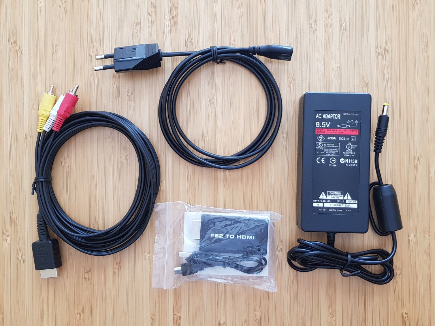 PlayStation 2 Slim SCPH-77003 с 3 оригинални игри + HDMI конвертор