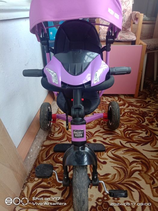 Трёхколёсный велосипед.