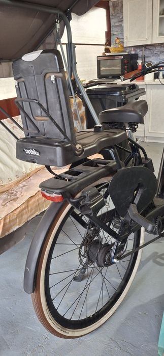 Vand scaun copil de bicicleta pt spate marca  Bobike