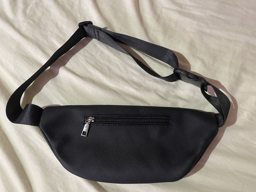 vand borseta Lacoste originala