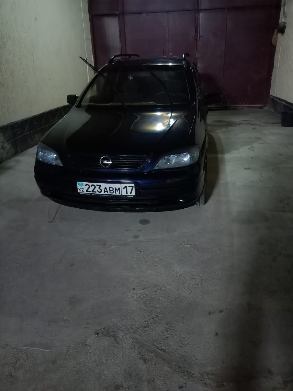 Машина Opel-Astra G