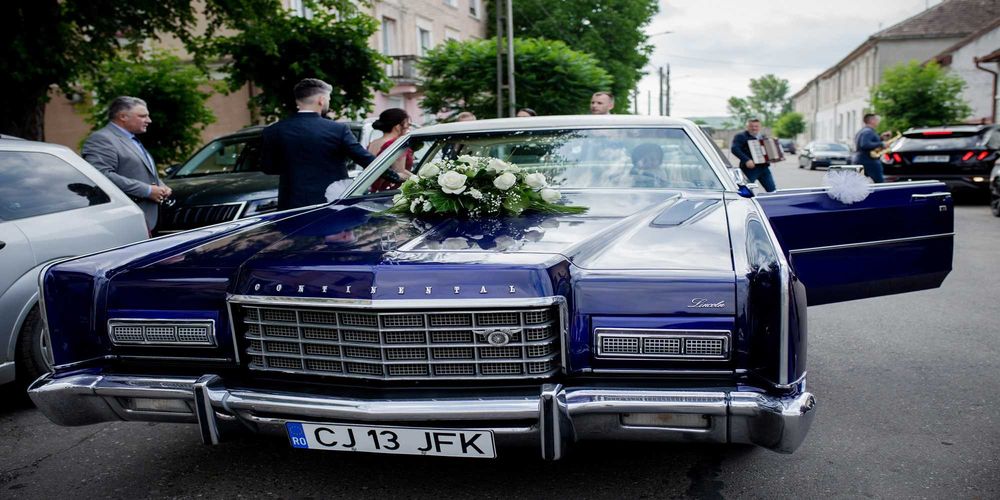 Limuzina vintage Excalibur epoca pentru evenimente nunti foto