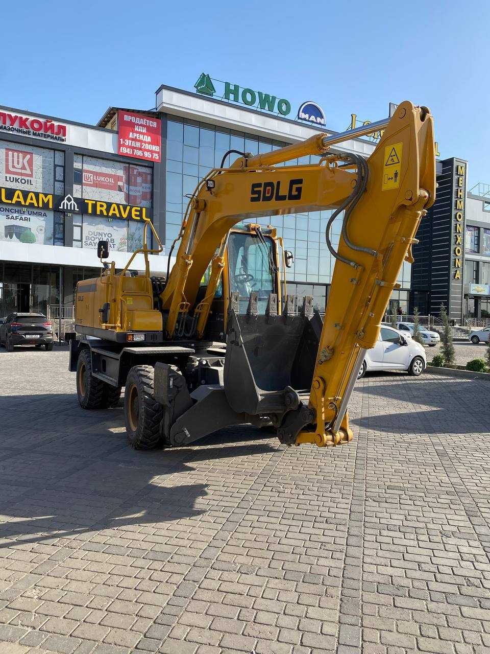 Колесный экскаватор SDLG   0,6 м³